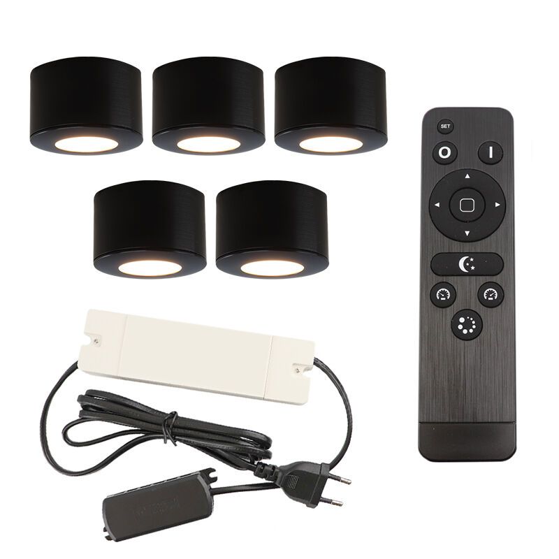 5 faretti da superficie neri tondi per veranda Vasso, IP44, con set di connessione e telecomando 5 faretti da superficie neri tondi per veranda Vasso, IP44, con set di connessione e telecomando