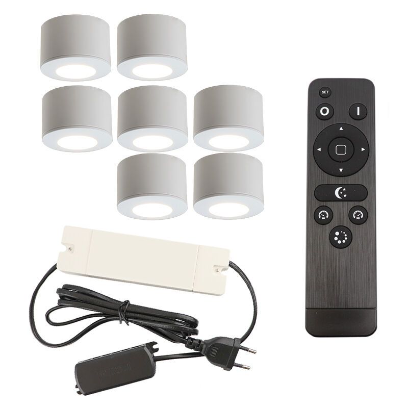 7 faretti da superficie bianchi tondi per veranda Vasso, IP44, con set di connessione e telecomando 7 faretti da superficie bianchi tondi per veranda Vasso, IP44, con set di connessione e telecomando