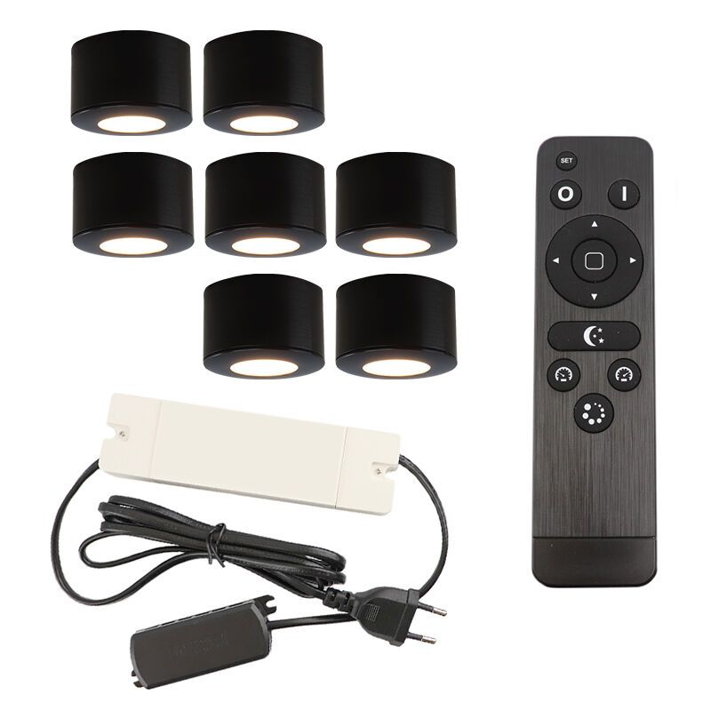 7 faretti da superficie neri tondi per veranda Vasso, IP44, con set di connessione e telecomando 7 faretti da superficie neri tondi per veranda Vasso, IP44, con set di connessione e telecomando